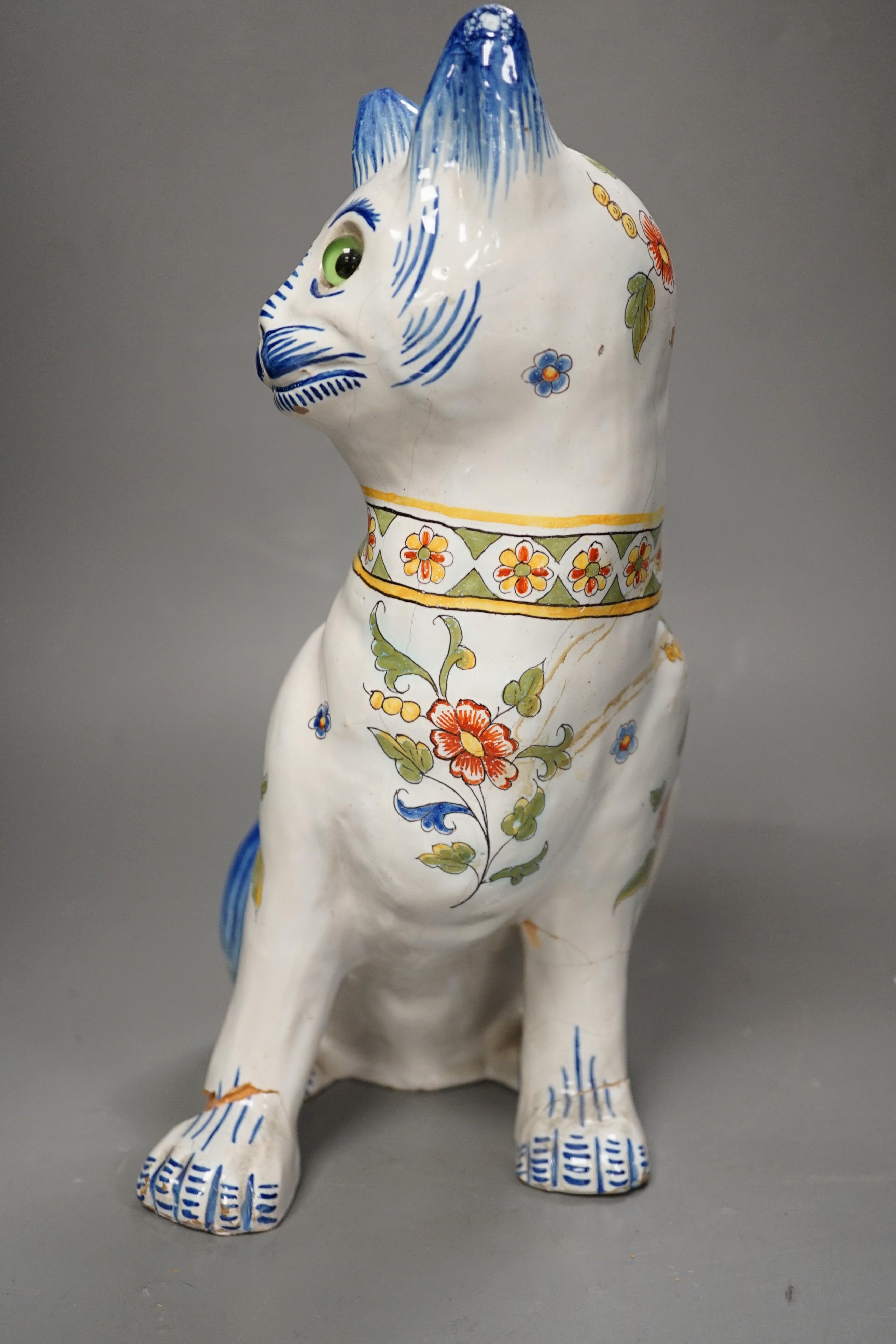 A Mosanic faience model of a seated cat, 31cms high